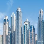 Stunning view of Dubai's iconic skyscrapers under a clear blue sky.